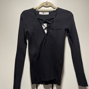 Zara black knit long sleeve shirt with deep v neck. Brand new with tags on!